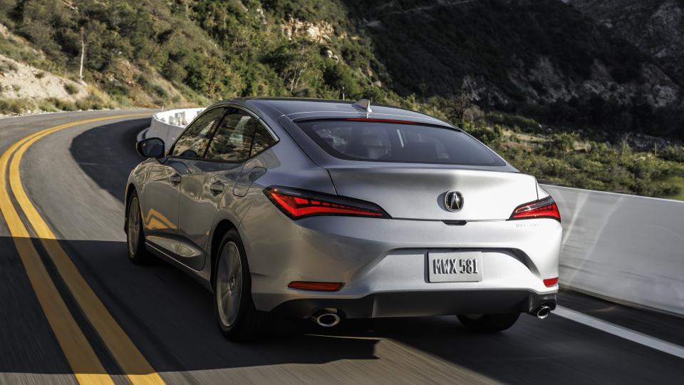 2024 Acura Integra driving on Angeles Crest Highway, it appears.