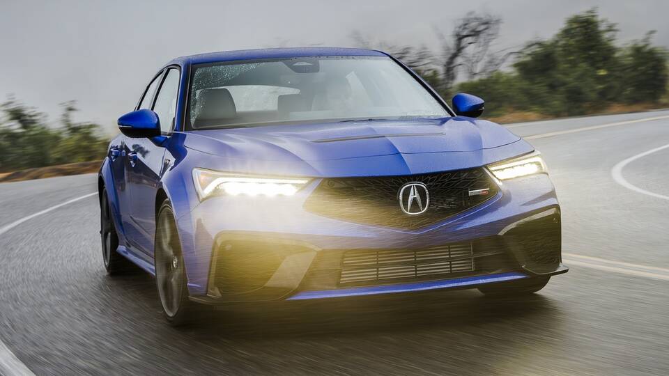 2024 Acura Type S navigates a wet corner