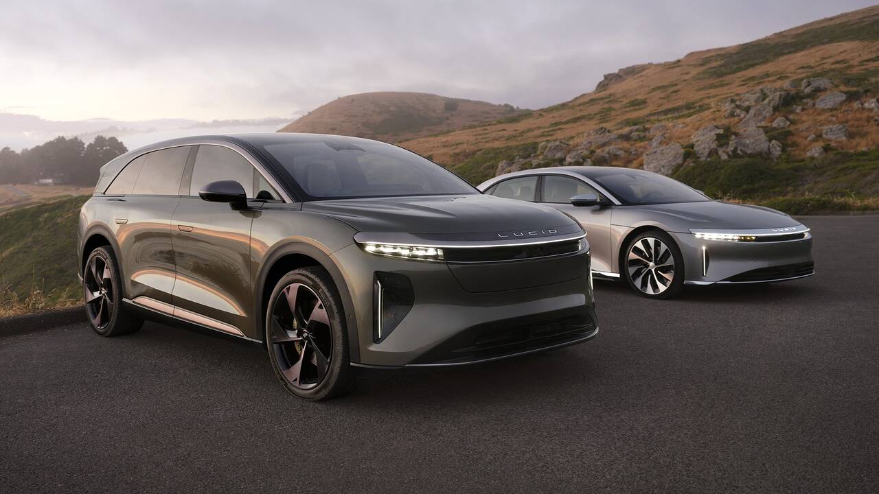 2026 Lucid Gravity parked next to a Lucid Air