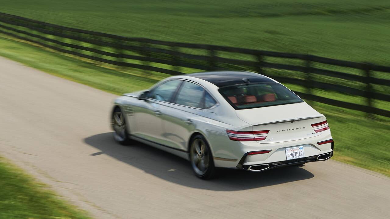 2025 Genesis G80 driving rear view