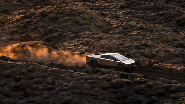 2025 Tesla Cybertruck driving in the desert