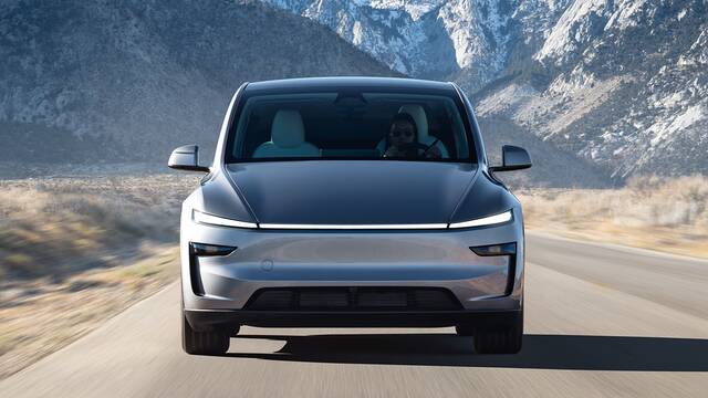 2025 Tesla Model Y driving head on