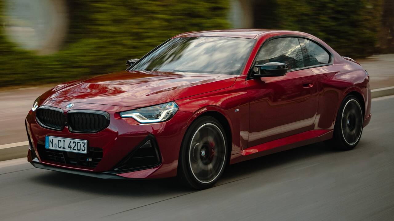 2025 BMW M240i driving front view