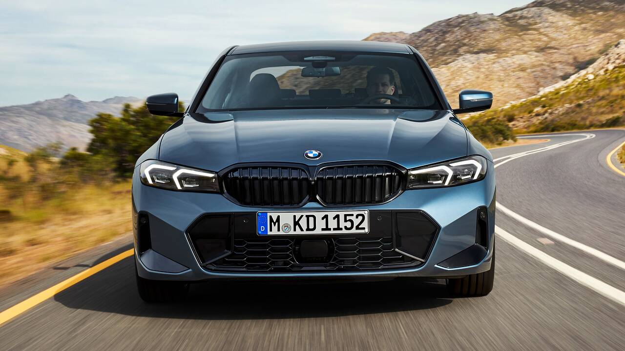 2025 BMW M340i driving front view