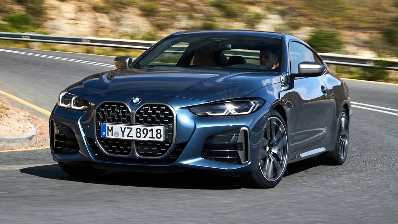 2024 BMW 4 Series coupe driving front view