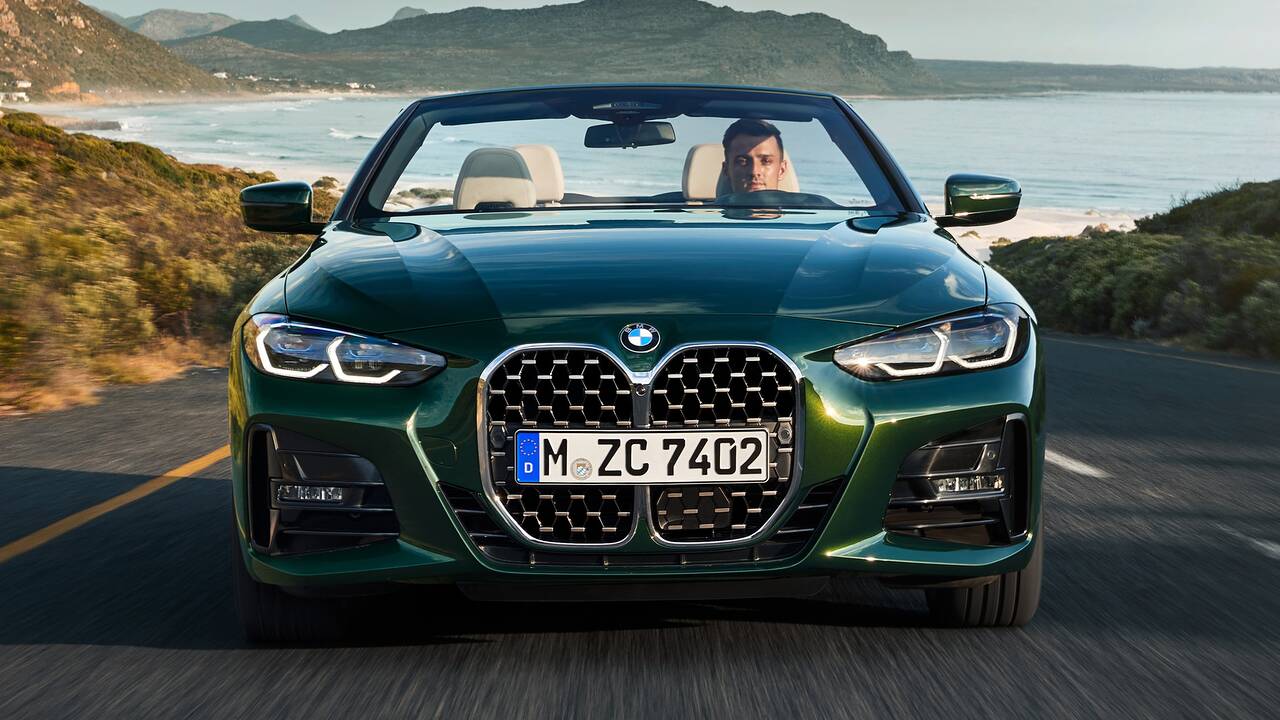 2024 BMW M440i Convertible driving front view