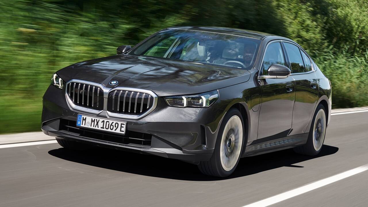 2025 BMW 5 Series Plug-In Hybrid driving front view