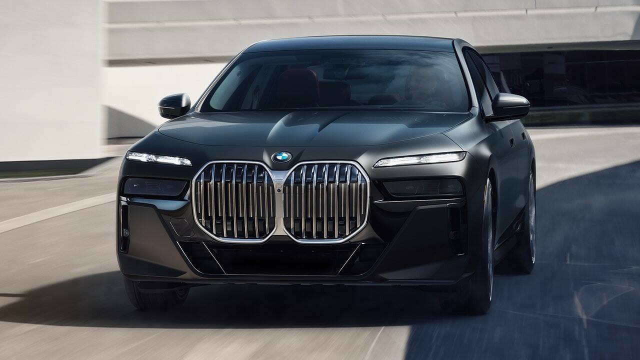 2024 BMW 7 Series driving front view closeup