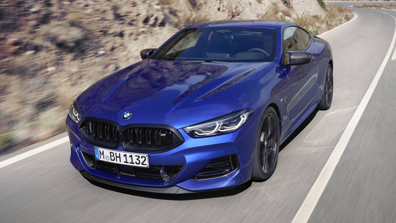 2025 BMW M850 xDrive driving front view