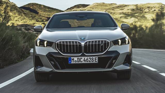 2025 BMW i5 driving front view