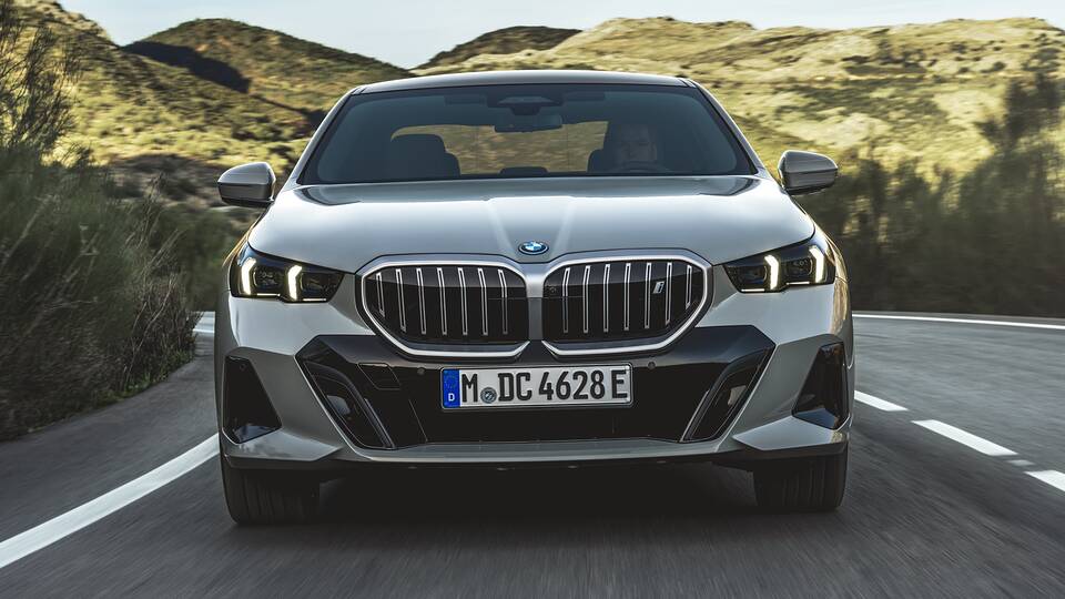 2025 BMW i5 driving front view