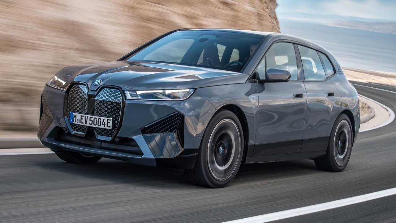 2024 BMW iX driving front view