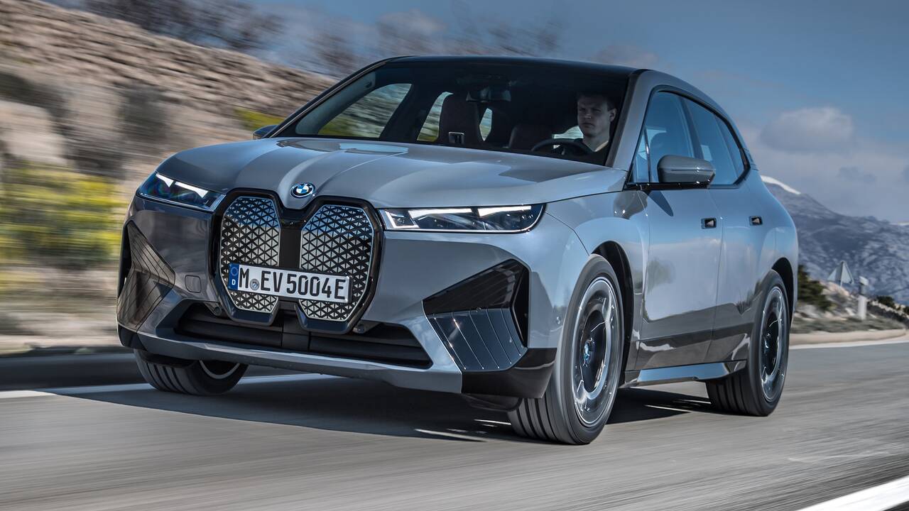 2025 BMW iX driving front view