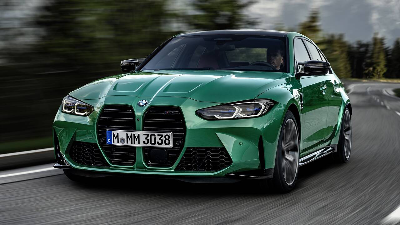 2024 BMW M3 driving front view