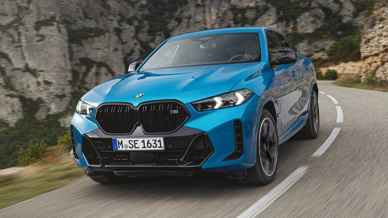 2024 BMW X6 driving front view