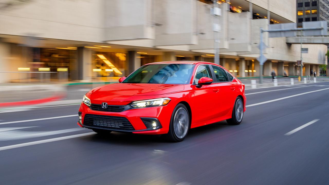 2024 Honda Civic Sedan Touring on the road