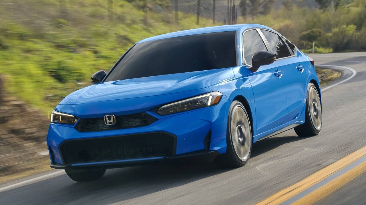 2025 Honda Civic Hybrid Hatchback driving front view