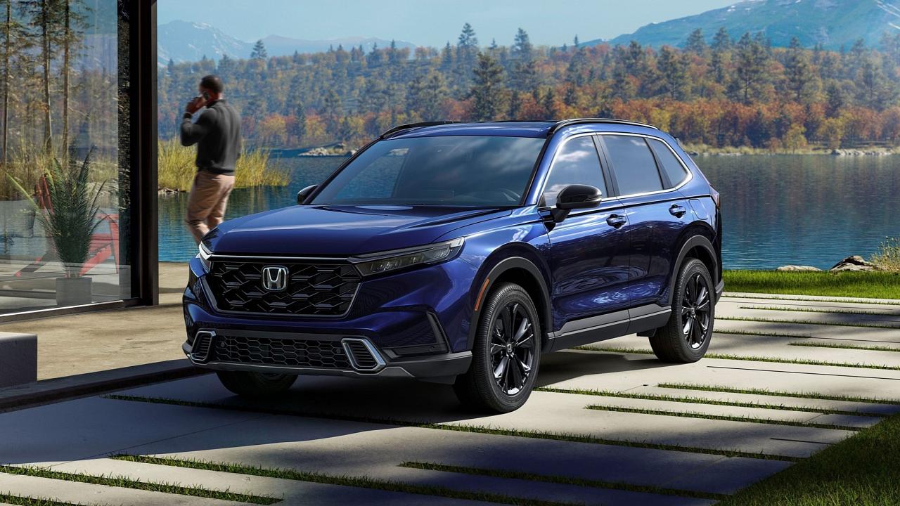 2024 Honda CR-V Hybrid parked next to a lake