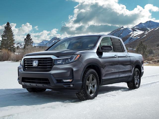 2024 Honda Ridgeline parked in a snowy field