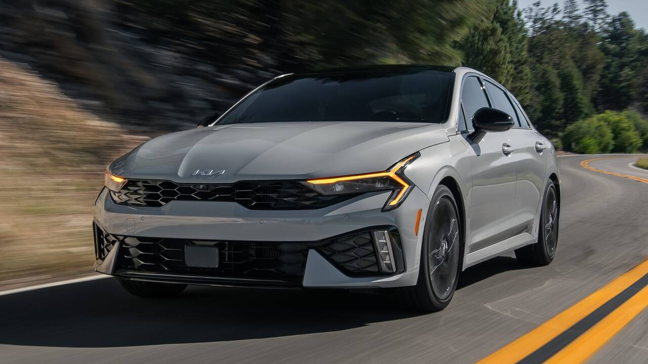 2025 Kia K5 driving front view