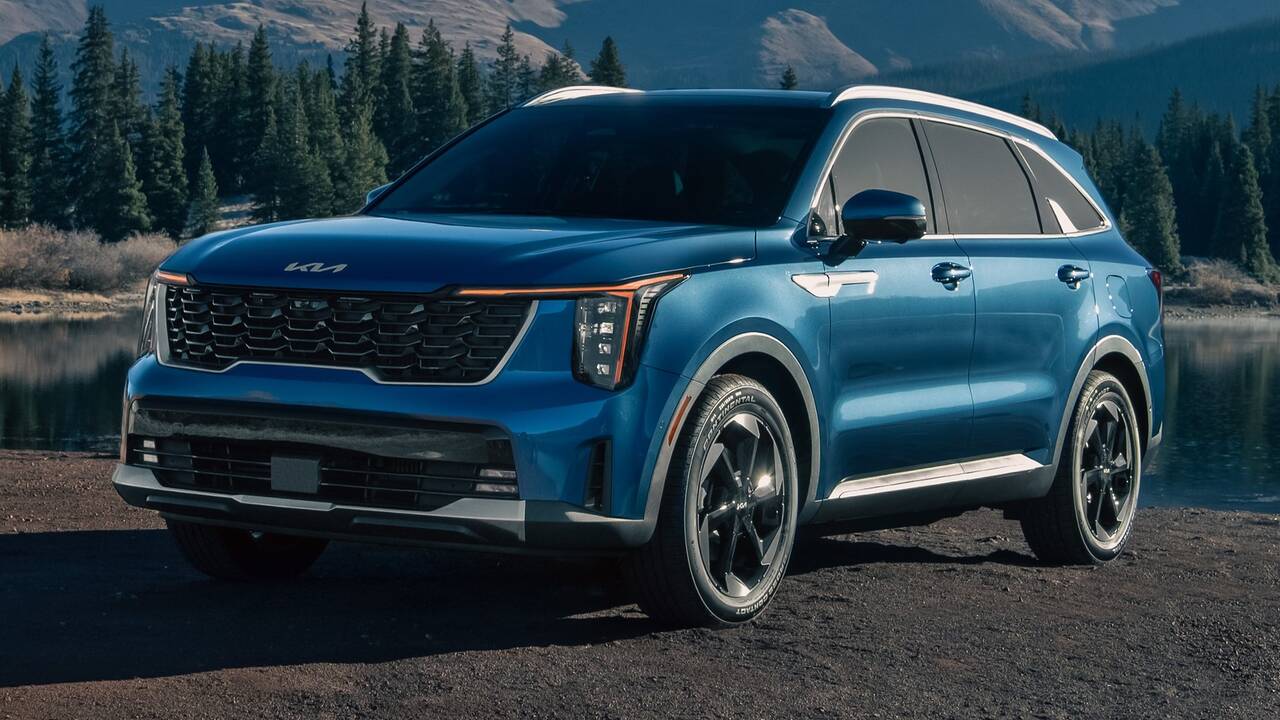 2025 Kia Sorento Hybrid parked by a lake