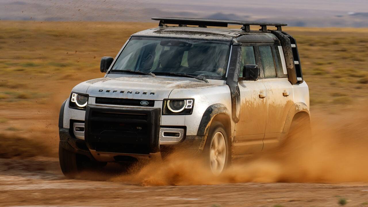 2025 Land Rover Defender 110 driving off-road