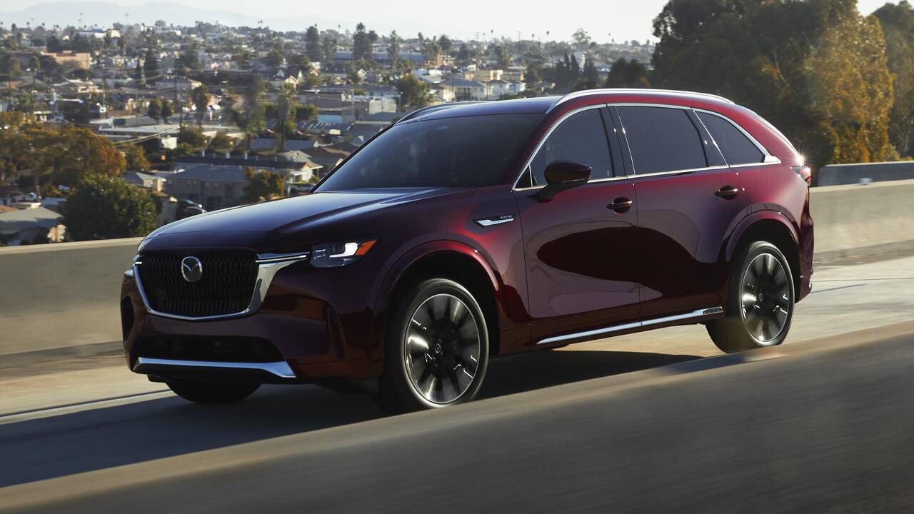 2025 Mazda CX-90 driving front view