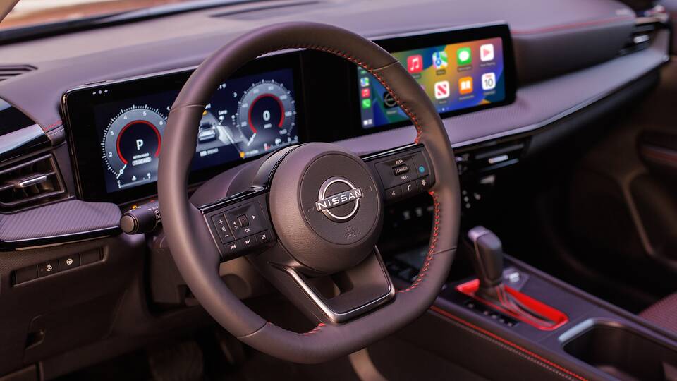2025 Nissan Kicks front interior with infotainment screens