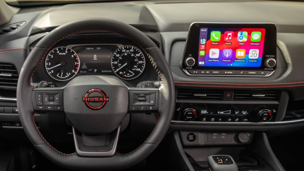 2025 Nissan Rogue Rock Creek front interior infotainment