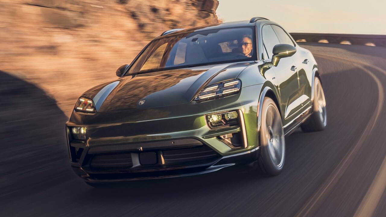2025 Porsche Macan Electric driving front view - cornering