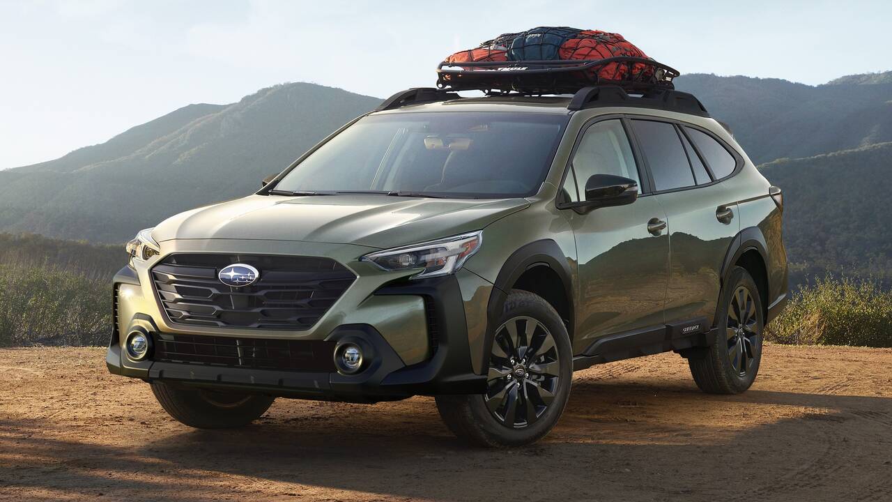 2025 Subaru Outback parked on a trail - front view