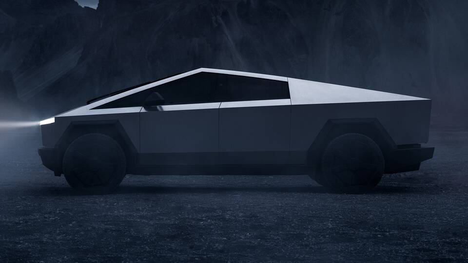 2025 Tesla Cybertruck parked side view - profile