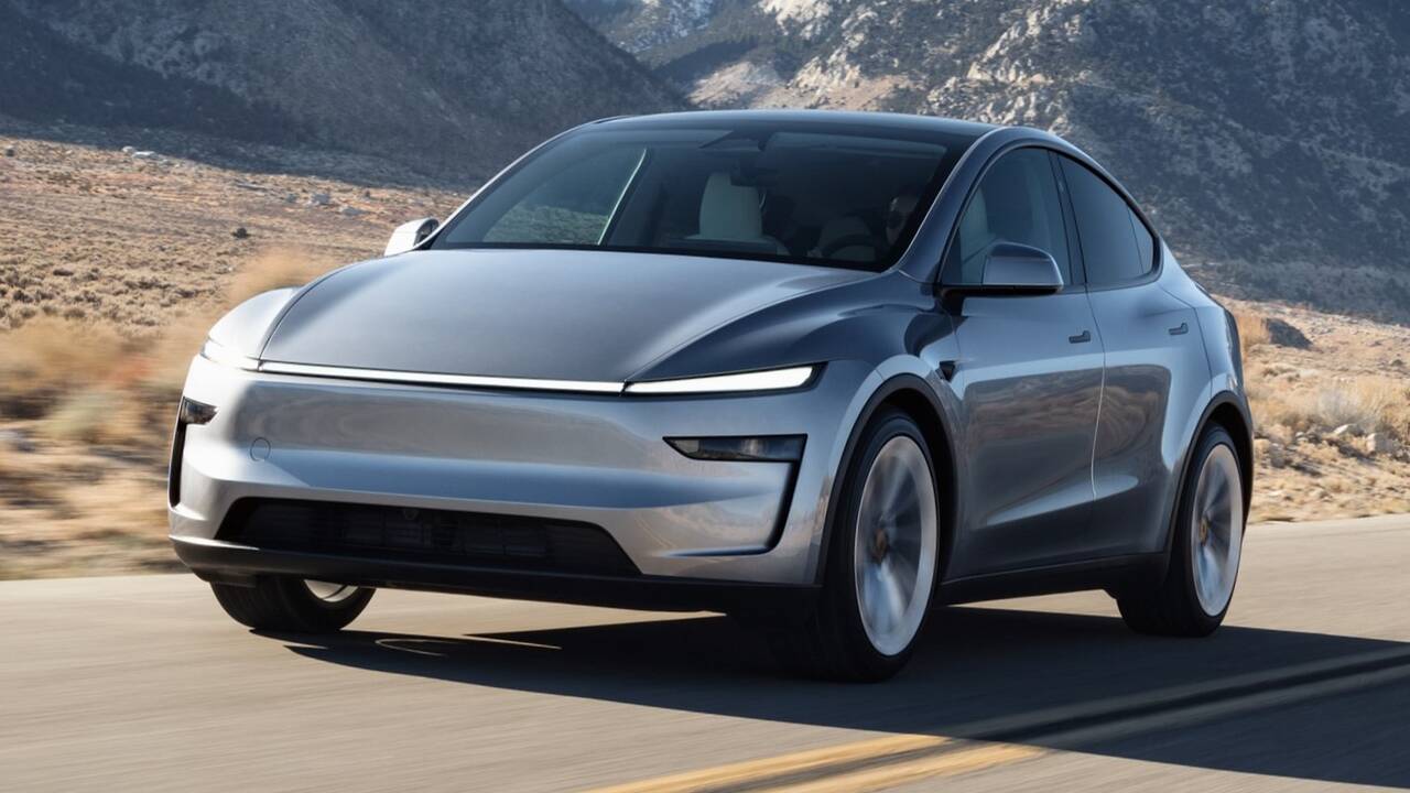 2025 Tesla Model Y driving front view