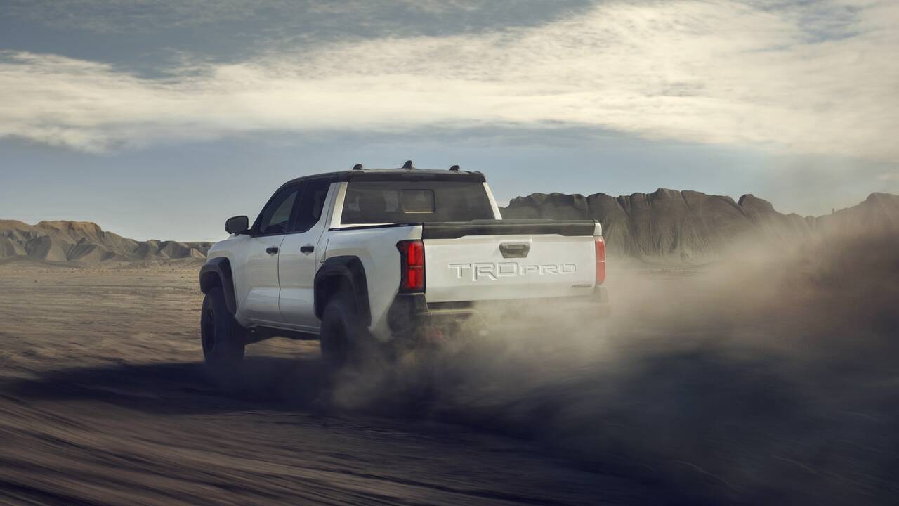 2024 Toyota Tacoma TRD Pro driving rear view