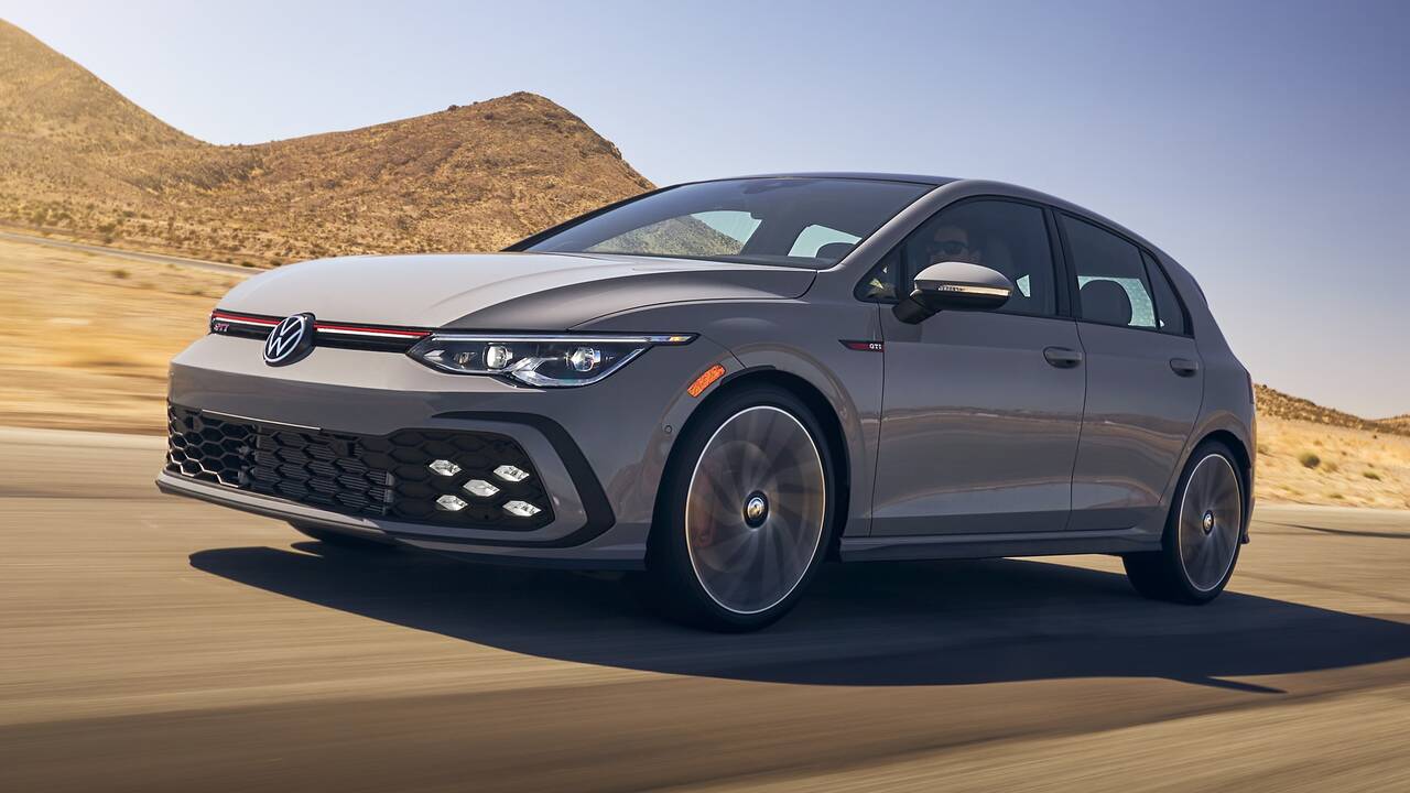 2024 Volkswagen Golf GTI driving front side view