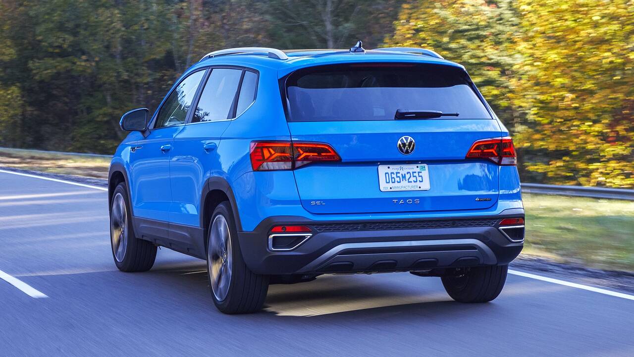 2024 Volkswagen Taos driving rear view